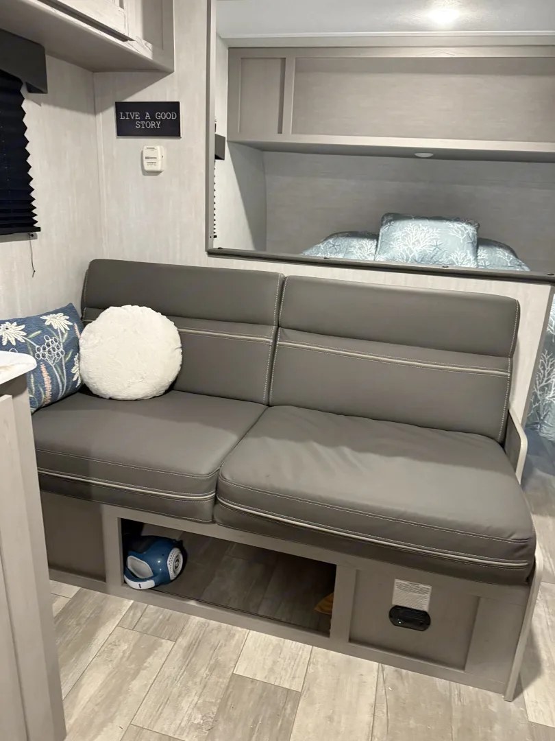 Sofa with view toward queen bed